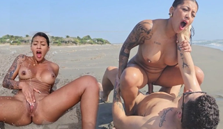 Развратная нимфоманка отдается группе парней на пляже